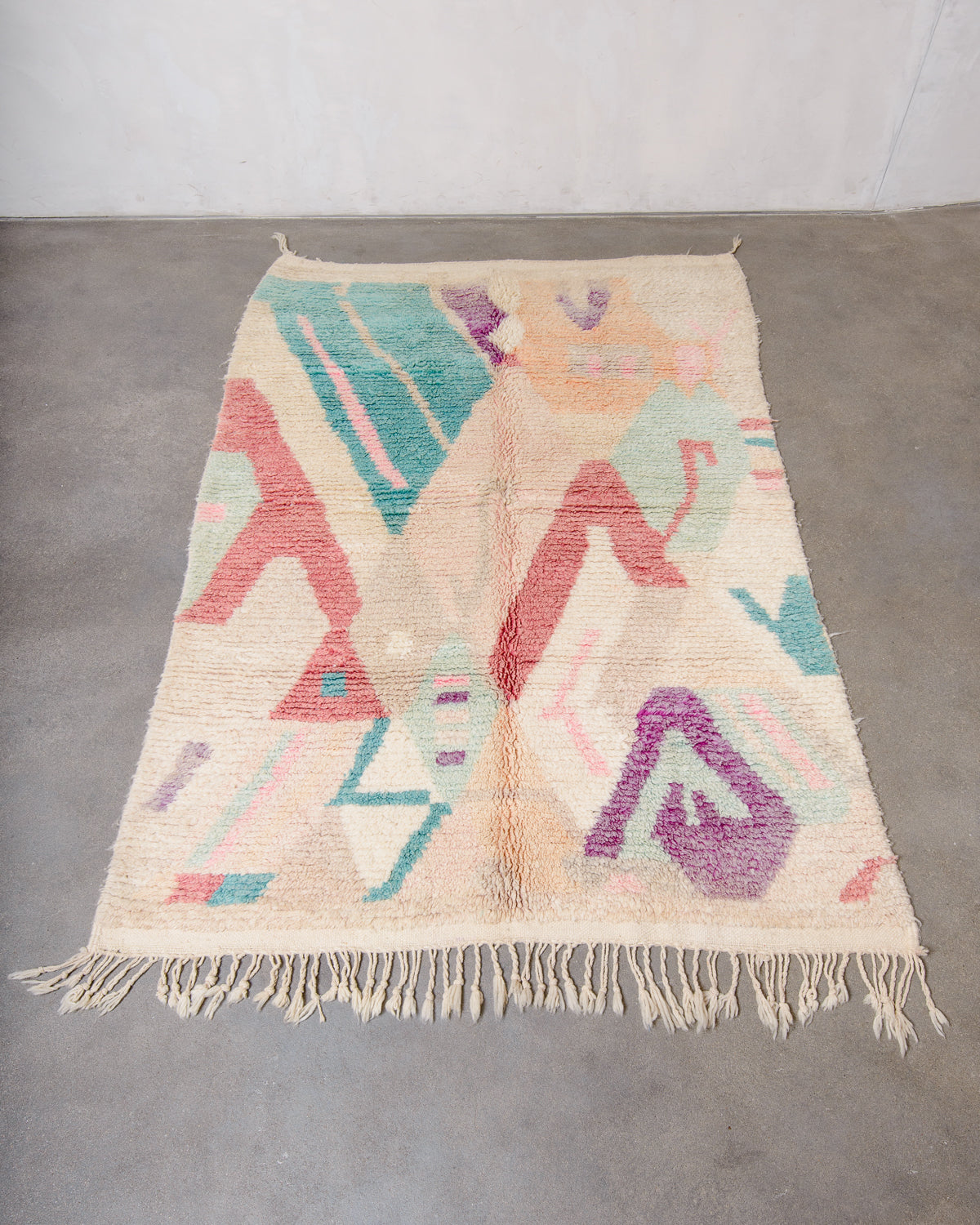 Modern, designer, handcrafted Berber rug from Morocco. Vintage carpet with beautiful colours and patterns and fluffy texture.